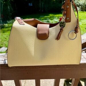 Calvin Klein yellow purse with a braided handles
